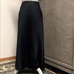 Solid black pleated skirt